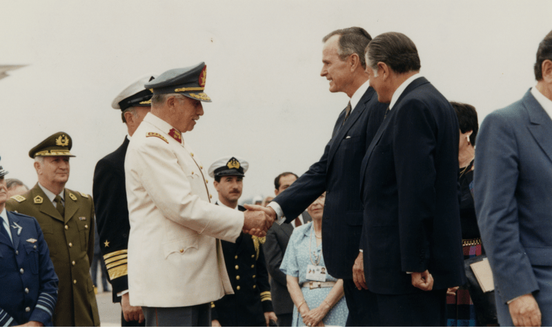Augusto Pinochet with George H.W. Bush